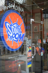 Naklejka premium sign and entrance to Sonic Boom, a record store, located at 215 Spadina Av, The Robertson Building, Toronto