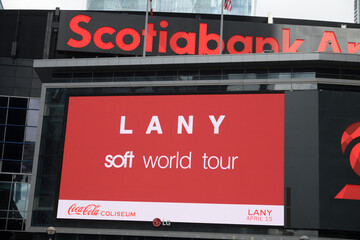 Naklejka premium digital billboard with concert promotion of LANY soft world tour outside Scotiabank Arena (Maple Leaf Square entrance), Toronto