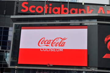 Naklejka premium LED sign outside Scotiabank Arena (Maple Leaf Square entrance) featuring ad for Coca-Cola Coliseum, Toronto
