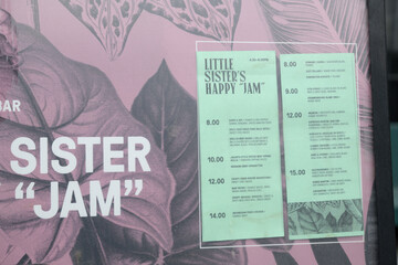 Naklejka premium close-up of paper menu board outside Little Sister Dutch Indonesian 102 Portland St, Toronto