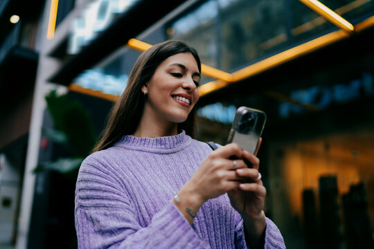 Pensive female designer holding stylus pen and tablet in creative office space. Young professional brainstorming project, digital art creation, planning strategy, architectural sketch, research.