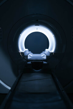 View of steryl tomography room in the dark. Medical equipment for MRI, CT. Scanning capsule for computer tomography imaging examination. Modernly equipped CT room. Shoot without people. Advertising.