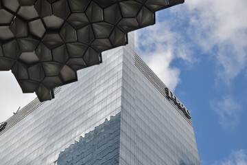 Naklejka premium skyward view of PwC (PricewaterhouseCoopers) Tower located at 18 York St (Southcore Financial area), Toronto (geometric canopy at Maple Leaf Square complex)