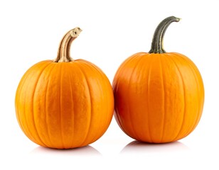 Obraz premium Two orange pumpkins, side by side, against a white background