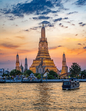 Bangkok, Thailand - Spectacular sunset over Wat Arun Temple in Bangkok