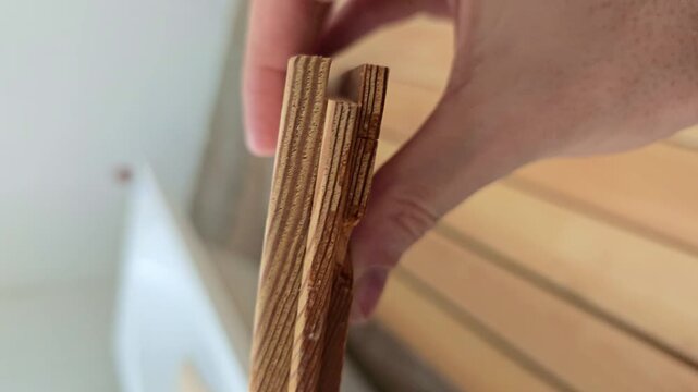 Close up of Milled Larch Parquet Board Structure with Tongue and Groove Joint for Professional Flooring Installation and Durability Testing in Modern Construction and Interior Design Engineering