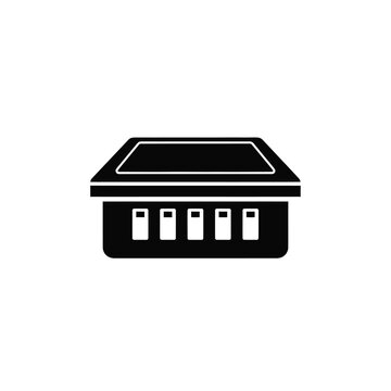 Black and white of an electric cooktop with four control knobs