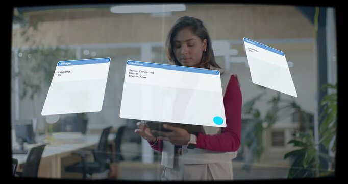 Female business user tapping tablet as three widgets appearing, rotating, settling checking status