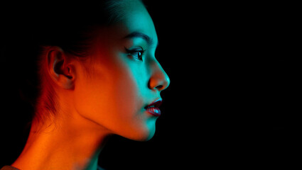 Fototapeta premium Woman profile face with colorful lighting