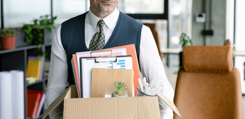 Fired jobless employee. Unemployment crisis of man dismissed. Business man packing stuff. Last day...