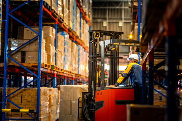 Modern distribution center with high storage rack full of cardboard boxes. Male industrial employee using forklift machinery for heavy pallet lifting and safe inventory management. © ultramansk