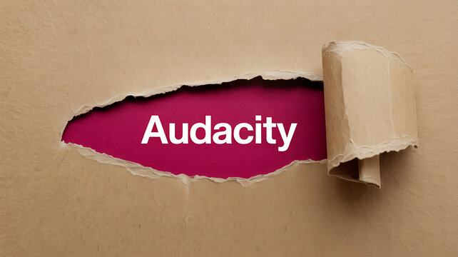 Torn paper revealing 'Audacity' on red background