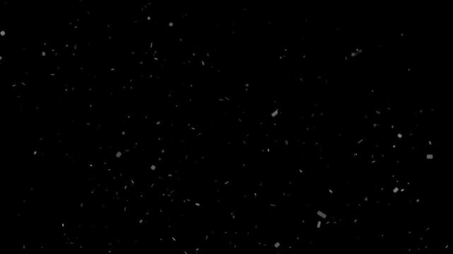Gentle slow motion white rectangular particles floating and falling like dust or snow on black