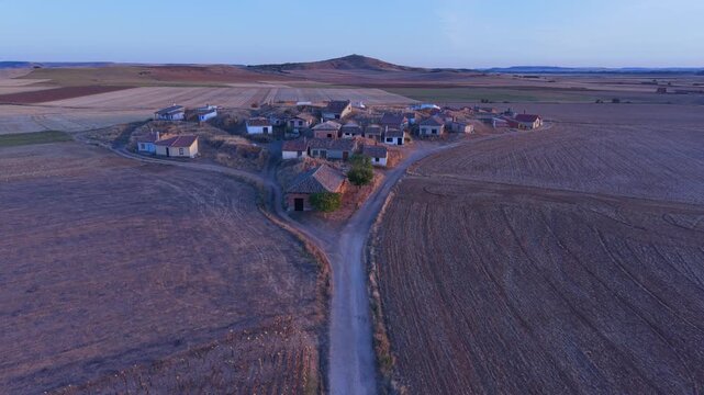 Aerial drone view of the Bodegas de Portugal wineries in the village of Arenillas de Riopisuerga, in the Odra-Pisuerga region. Burgos, Castile and Le&oacute;n, Spain, Europe.