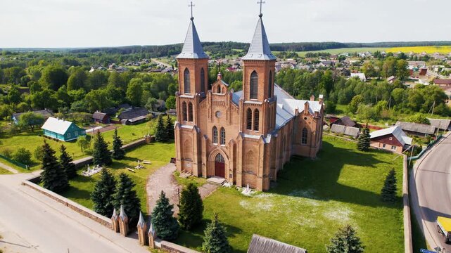 Aerial drone shot of a historic gothic catholic church in Europe