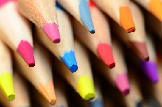 A macro artistic shot for color pencils tips with selective focus points.