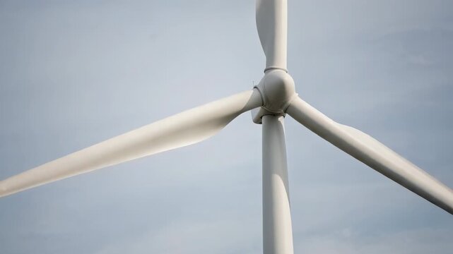 Elegant wind turbine blades in smooth motion for sustainable energy and clean power generation