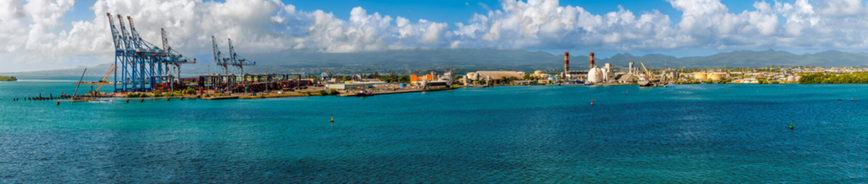 A panorama view across the industrial port in Pointe a Pitre, Guadeloupe on a bright morning
