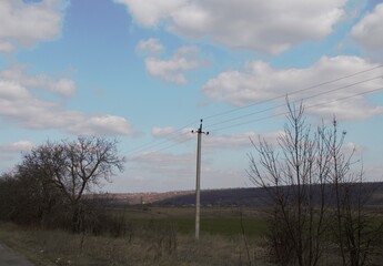 Obraz premium Power lines in a field