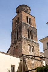 Fototapeta premium Salerno cathedral bell tower reaching blue sky