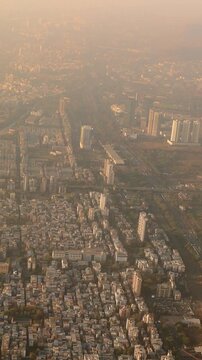 Dakc lake, Koperkhairne, Kopar Khairane, Navi Mumbai, Maharashtra, India. Mumbai Metropolitan Region. Aerial View From Airplane Window On View of the Mumbai suburb district. Evening morning sunset
