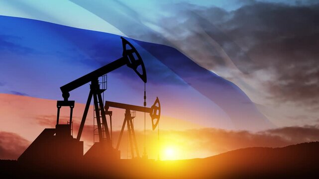 The change in oil prices caused by the war. Oil prices are rising because of the global crisis. Oil drilling derricks at desert oilfield with Russia flag. Crude oil production from the ground.