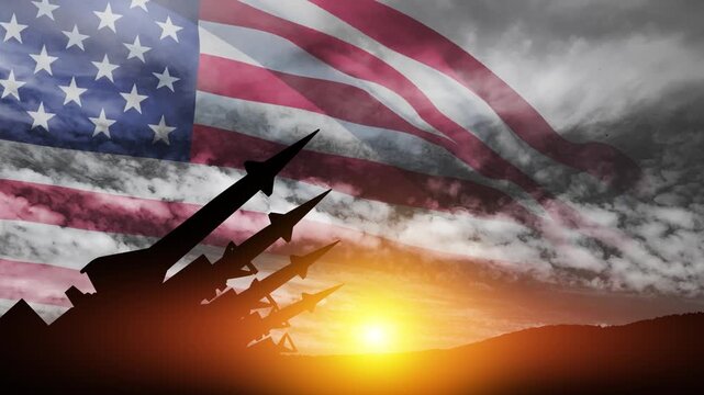 The missiles are aimed at the sky at sunset with USA flag. Bomb, chemical weapons, missile defense, a system of salvo fire.