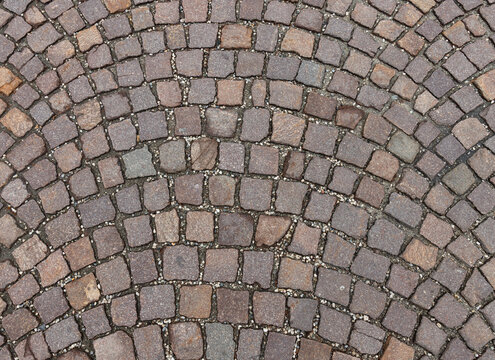 Circular cobblestone pavement pattern texture background