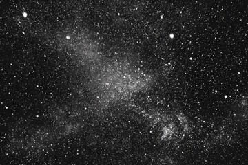 Obraz premium Cosmic expanse illustration featuring numerous stars and nebulous clouds