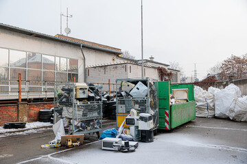 Naklejka premium Electronic Waste Recycling Yard With Dumpsters, Old Appliances And Scrapped Electronics
