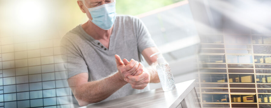 Man rubbing his hands with sanitizer; prevention of virus and bacteria infection; multiple exposure