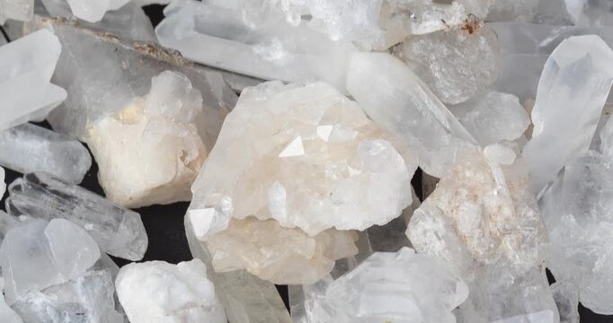 Zoom out of a textured white quartz mineral stones