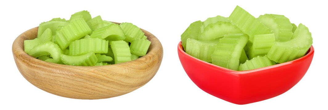 fresh celery in wooden and ceramic bowl isolated on white background with full depth of field