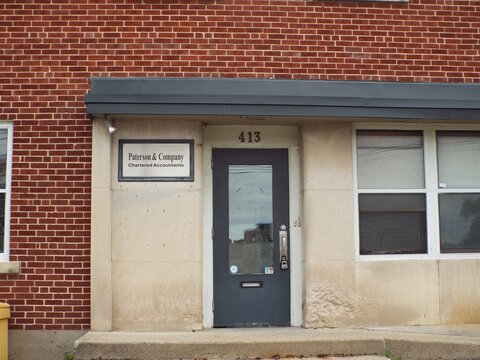 Ottawa, Ontario, Canada-July 22, 2025: The entrance to "Paterson and Company Chartered Accountants" at 413 Churchill Avenue North.