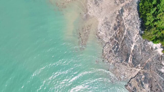 Top down aerial turquoise sea water texture Phuket Thailand