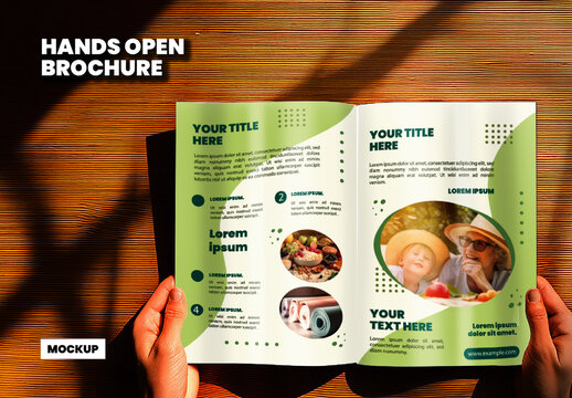 Hands Holding Open Brochure Mockup