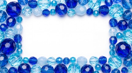 Fototapeta premium A frame of blue and clear beads on a white background, perfect for adding text or images.