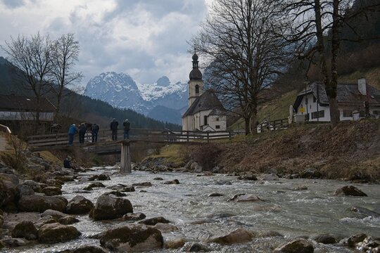 famous viewpoint in Ramsau over the Ramsauer Ache river to the parish church of St. Sebastian