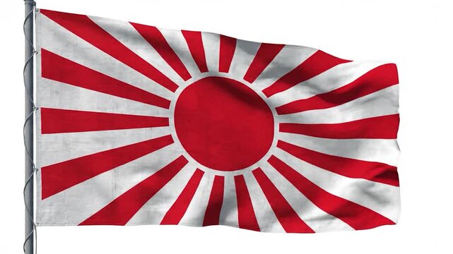 A red and white striped flag with a central red circle waves