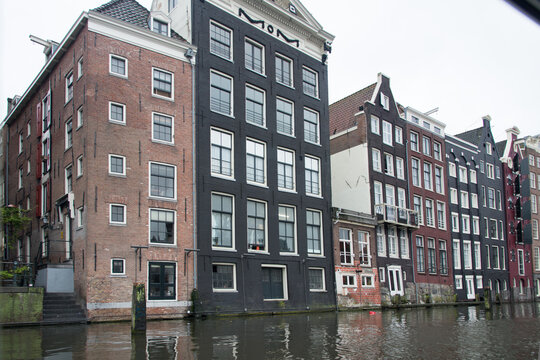 View of Amsterdan waterfront at Prinsengracht canal from a boat