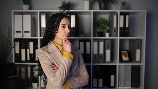 Pensive ethnic business woman thinking idea serious businesswoman think pondering solution hesitate unsure girl holding chin deciding thoughtful solving work question in office female lady specialist