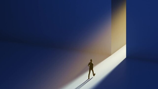 A man walking to a gap in the wall with light spilling out. Concept for positivity, getting out of a depression, the way forward.