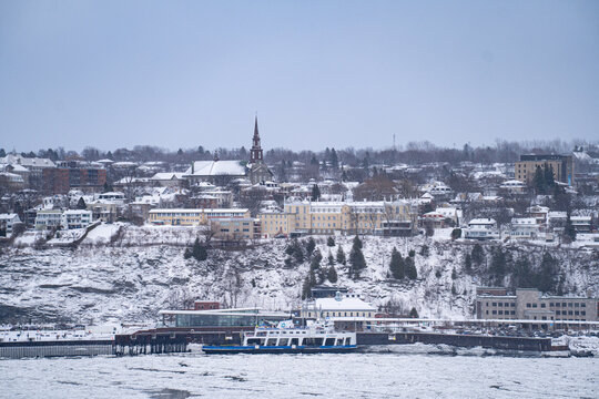 View of Levis city and St. Lawrence River from Quebec City during winter.