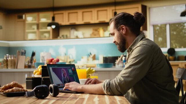 Photo editor designer retouching images on laptop, remote work lifestyle with photo editing software. Color correction and visual effects used to enhance photography for media content.