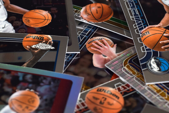 Collection of basketball trading cards featuring closeups of players hands holding or controlling the ball. Cropped sports imagery emphasizing action details and movement.