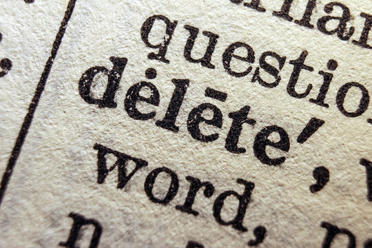 Word delete printed on dictionary page, macro close up