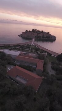 Aerial View of Sveti Stefan Montenegro during Golden Hour with Pink Sky
