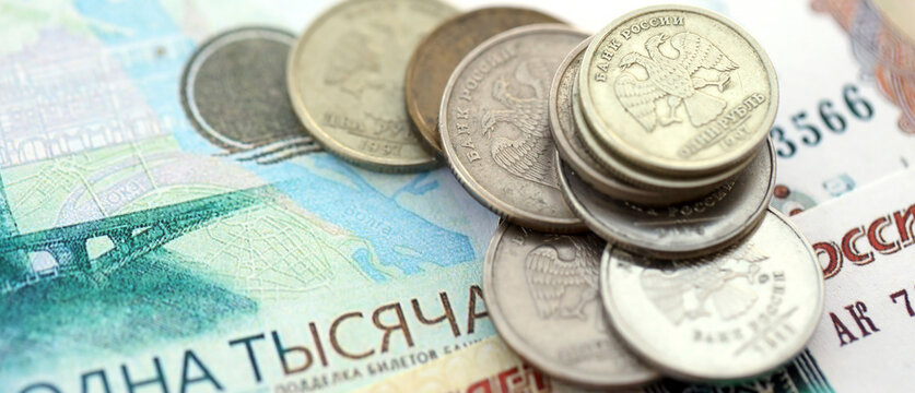 Coins and banknotes of Russian Federation ruble currency. Russia RUB money close up. Business, economy and finance concept