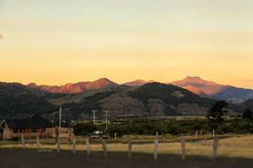 Rural patagonia landscape at sunset with mountains glowing © Fernando
