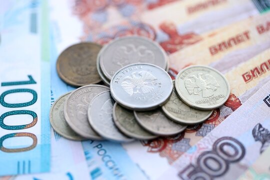 Coins and banknotes of Russian Federation ruble currency. Russia RUB money close up. Business, economy and finance concept